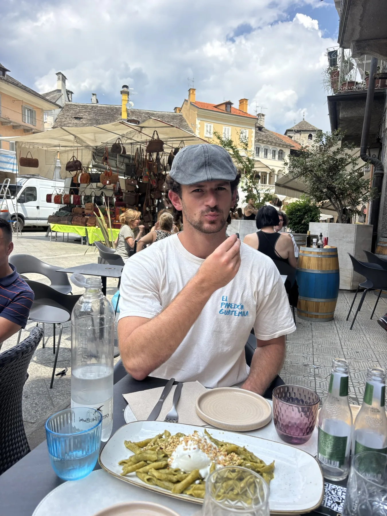 Chase eating pasta during the unexpected border-town stop